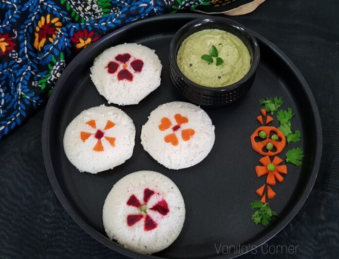 Idlis decorated with vegetables